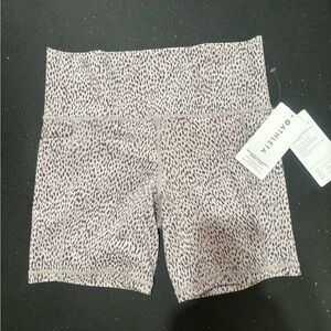 Athleta Salutation Stash Pocket II 7” short.